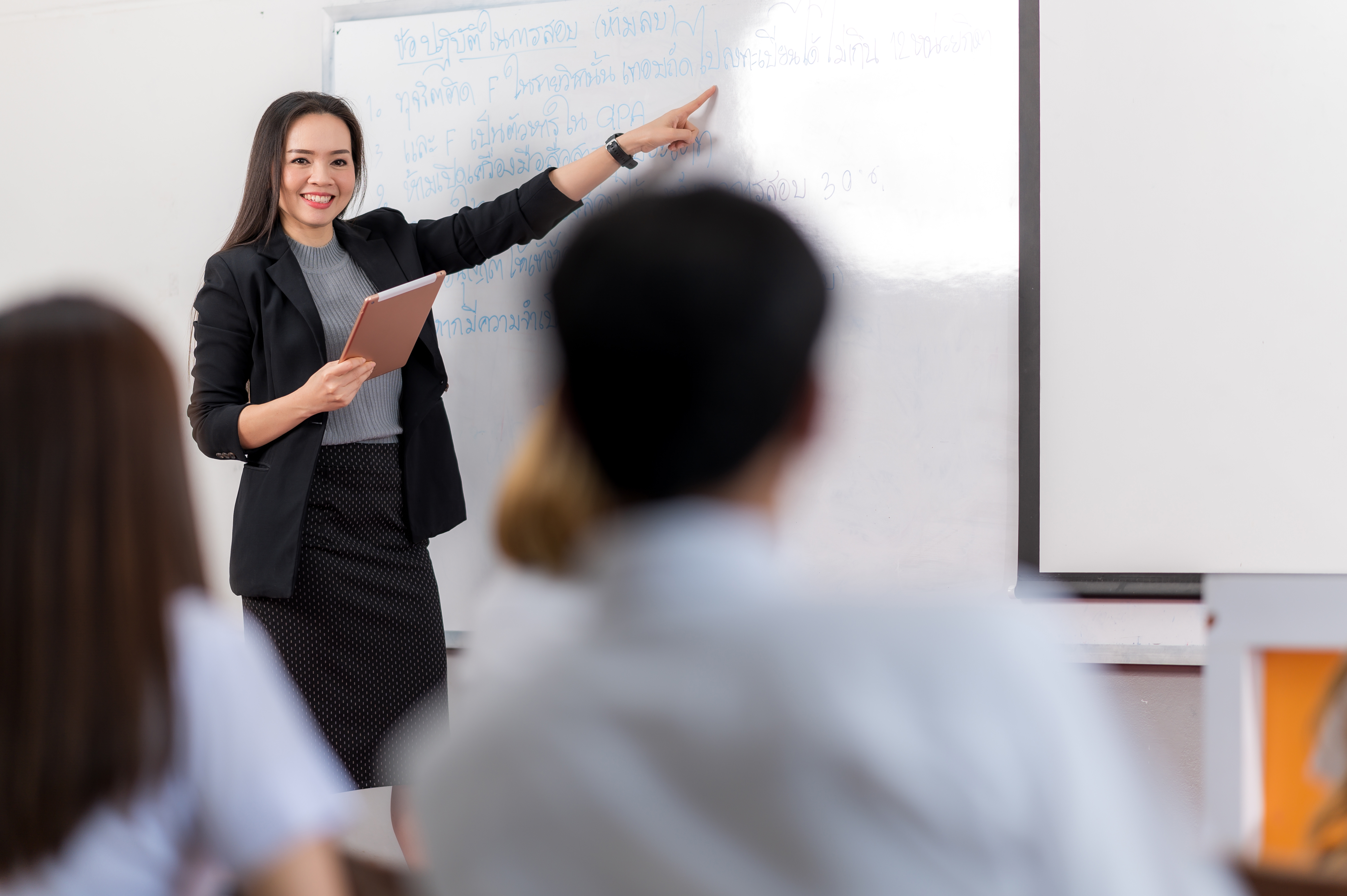 Stock image of professor teaching class